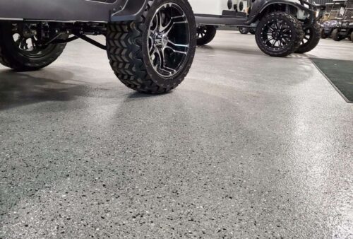 Beyond making garages gleam, epoxy floors deliver game-changing safety features and maintenance benefits that transform your space forever.