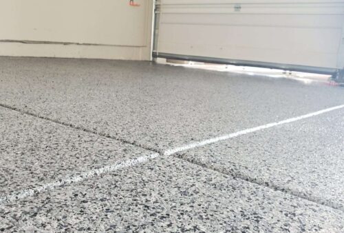 How epoxy garage floors transform basic concrete into a showstopping feature that dramatically boosts your home's resale appeal and buyer interest.