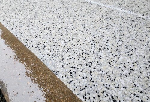 Professional epoxy garage flooring transforms concrete into a stunning, durable surface that boosts home value, but choosing the right system matters.
