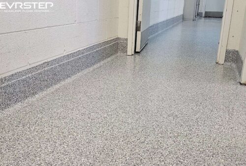 Discover the key factors influencing commercial epoxy flooring prices, including material quality, installation, and surface preparation.