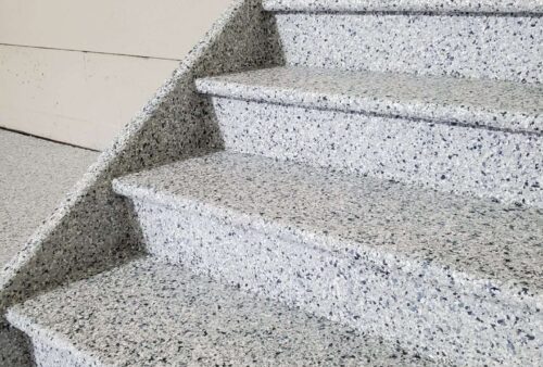 Stunning epoxy garage floors blend beauty with durability, transforming ordinary spaces into showroom-worthy environments that enhance your home's value.