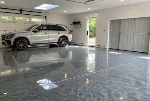 Epoxy garage floor coating providing durability and easy maintenance for busy homeowners, Garage Floor Epoxy near me