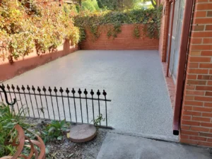 Can cleaning affect the longevity of outdoor epoxy systems