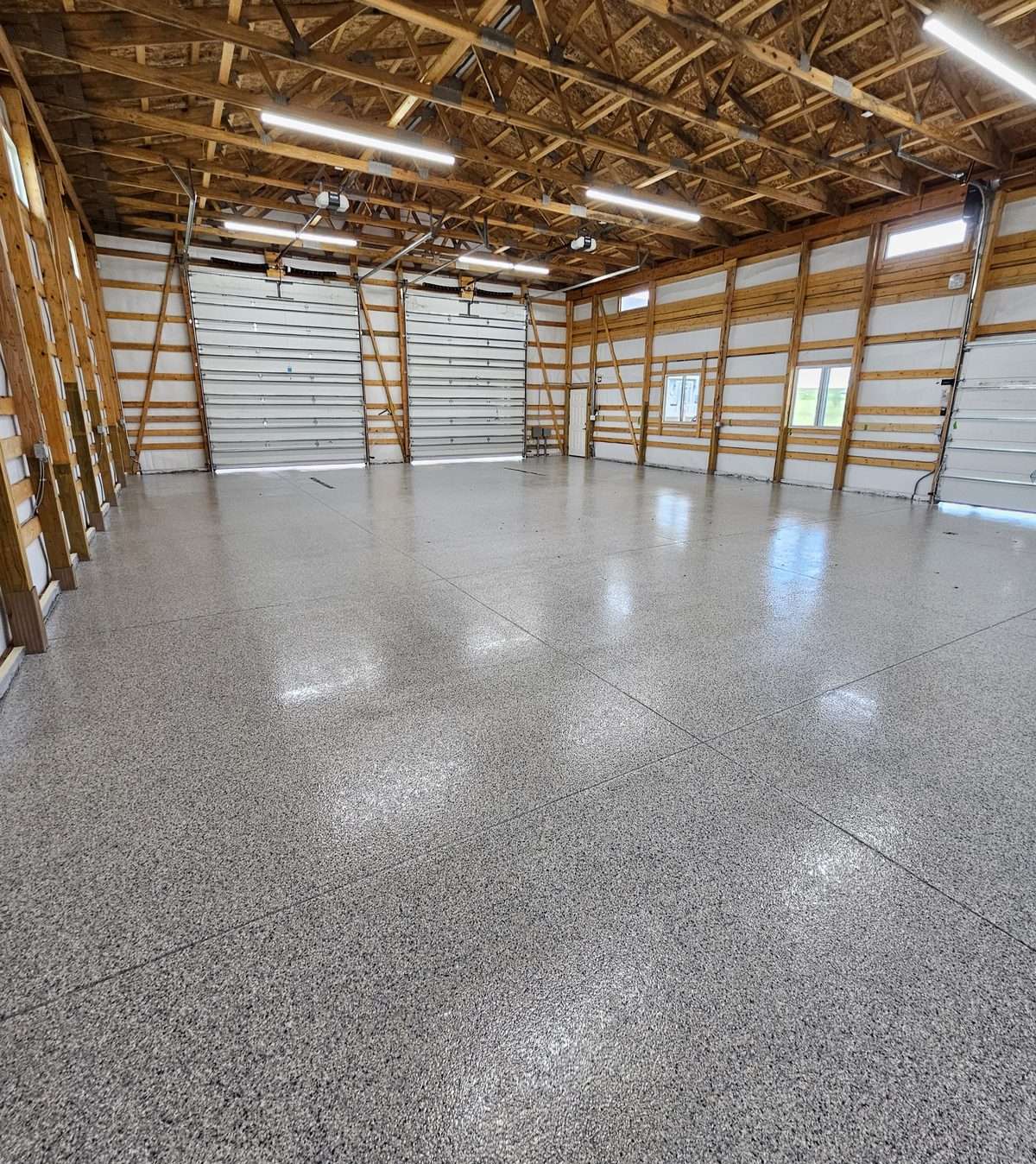 Slip-resistant coating in a working animal facility