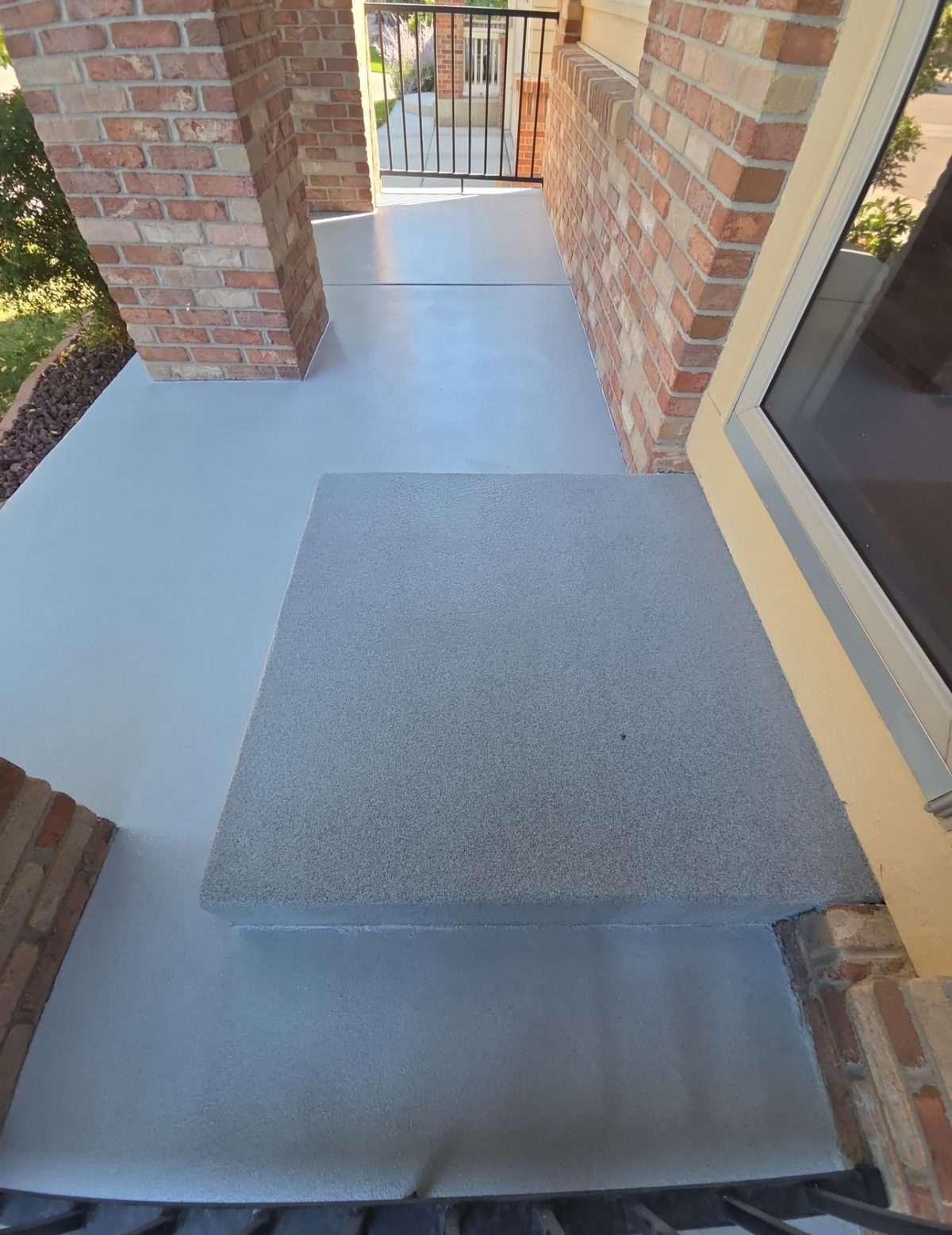 Anti-slip coating on an exterior concrete slab