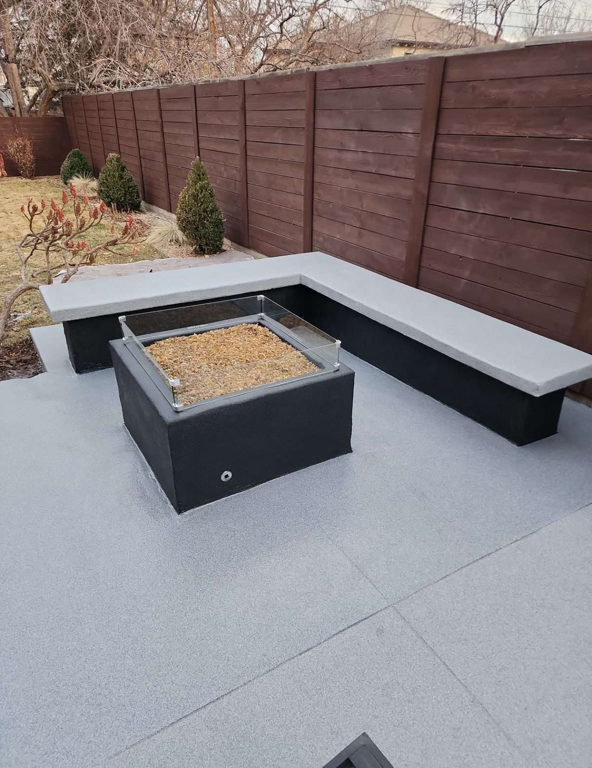 Coated concrete walkway and seating area
