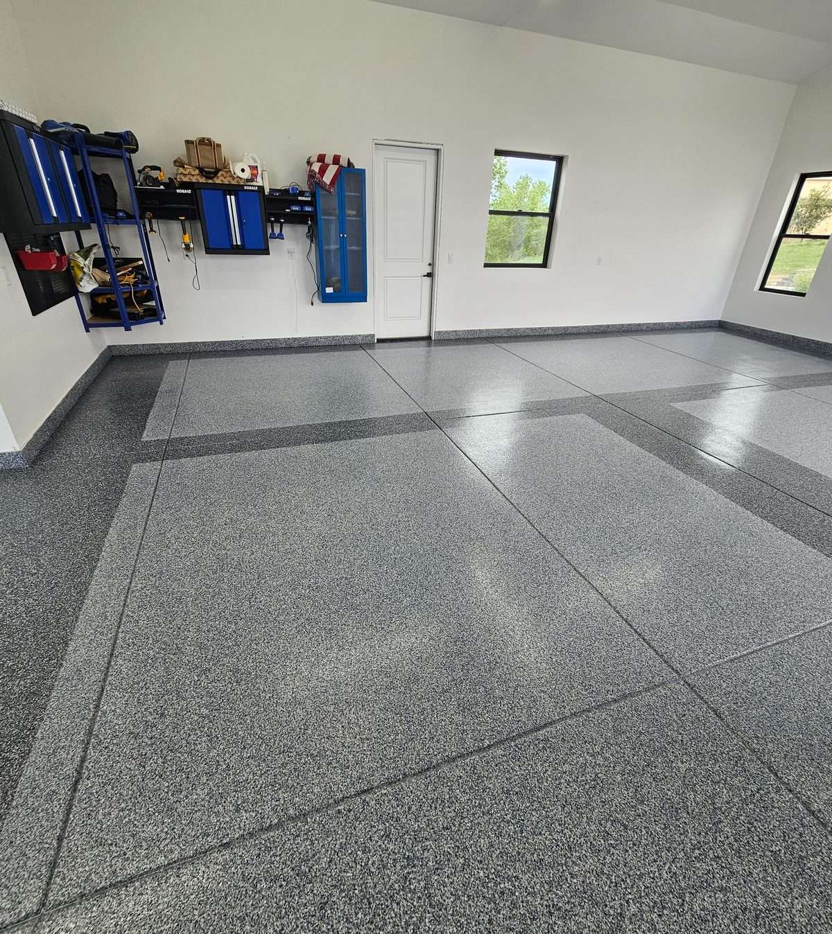 Discover what an epoxy garage floor coating is, how it works, and why EvrStep’s multi-layered systems offer lasting durability and a polished finish.