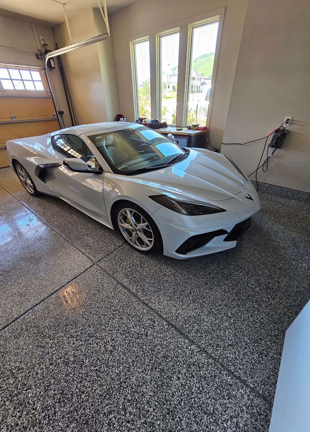 Stunning epoxy garage floors blend beauty with durability, transforming ordinary spaces into showroom-worthy areas.