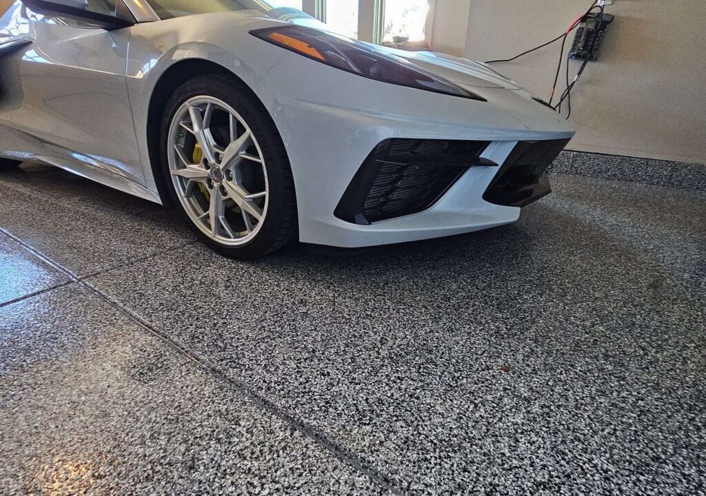 Stunning epoxy garage floors blend beauty with durability, transforming ordinary spaces into showroom-worthy areas.